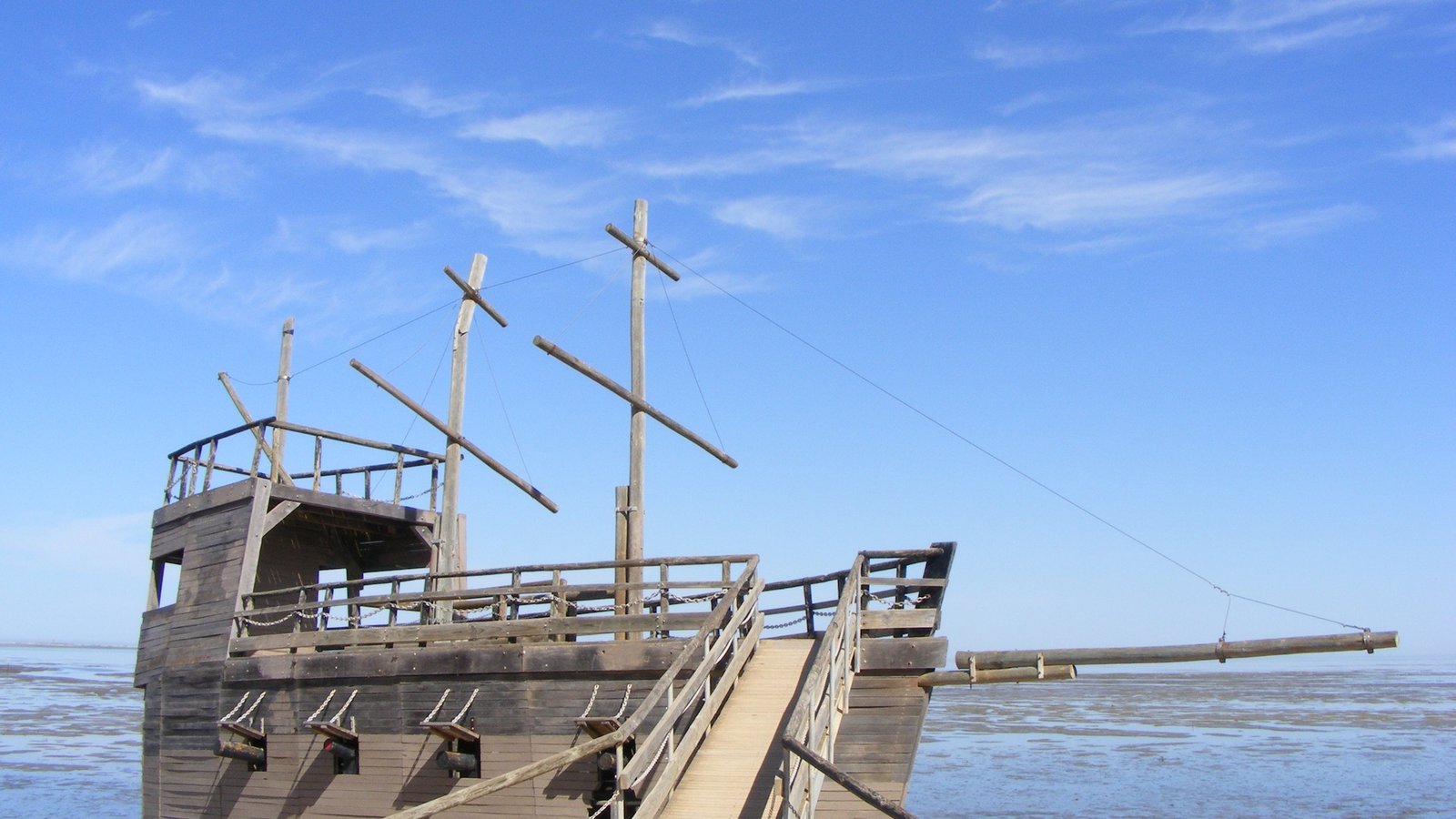A weathered mock pirate ship structure, used to represent a shipwreck-themed mini-golf hole