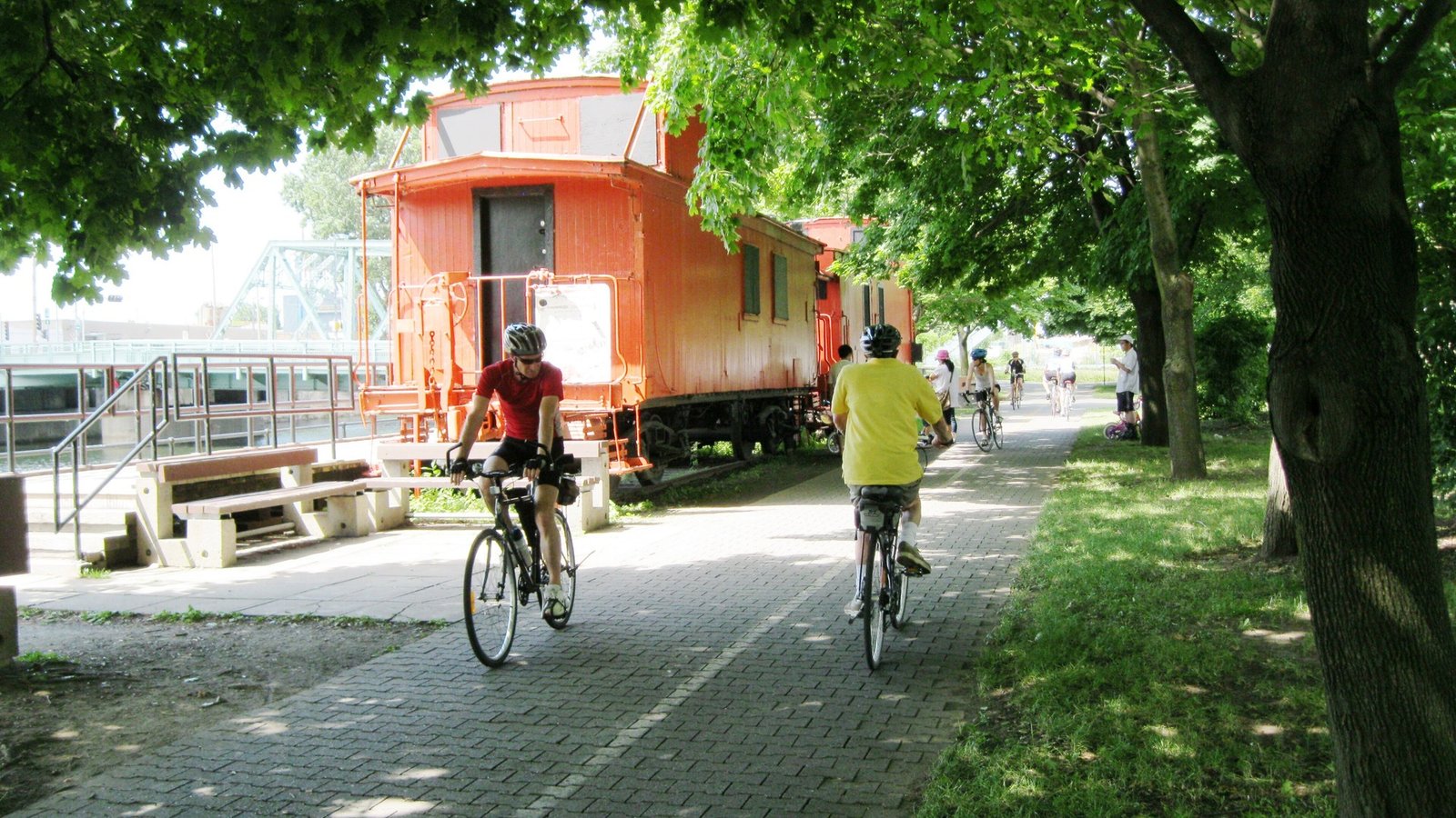 The paved Lachine Canal bike path running alongside the historic waterway in Montreal