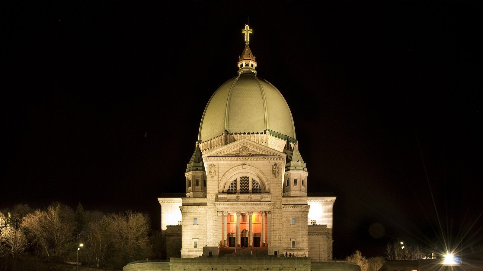 Saint Joseph's Oratory's massive copper dome illuminated at night, Montreal
